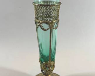 Antique green trumpet vase in an ornate brass floral stand