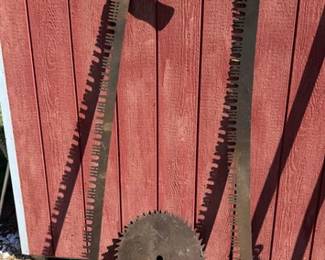 Vintage two-man crosscut saws and saw blade