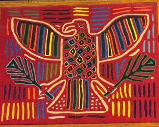 Hand-sewn, framed mola textile created by the Kuna people of the San Blas Islands in Panama