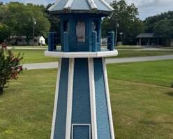 Lighted outdoor resin lighthouse