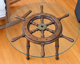 Vintage ship's wheel table with glass top, one of several available in this auction