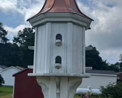 Vinyl two level birdhouse with copper roof