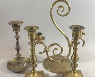 Brass candlesticks and candelabra