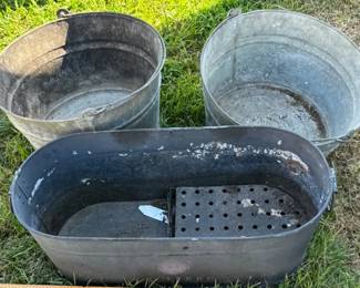 Galvanized buckets and drainage tub