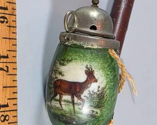 Detail of antique European hunting folk art tobacco pipe
