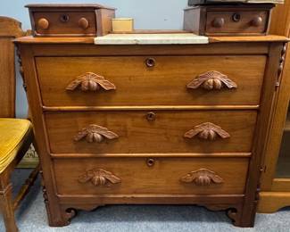 Antique Victorian dresser with carved wood drawer pulls