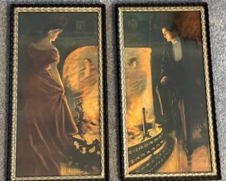 Vintage framed prints titled "Firelight Fancies" ("She" and "He") by artist Alfred James Dewey