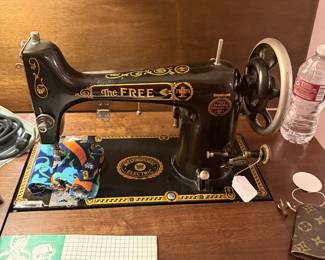 Westinghouse sewing machine/antique cabinet