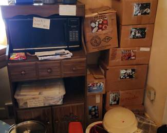 Microwave, stand, pans, boxed dishes