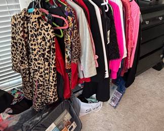 Heavy-Duty Rolling Garment Rack with Assorted Clothing