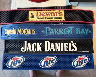 Collection of Four Branded Bar Spill Mats: Miller Lite, Jack Daniel's, Captain Morgan's Parrot Bay, and Dewar's