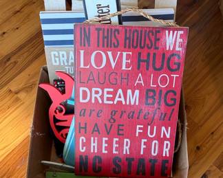 NC State 'In This House We Love Hug Laugh A Lot Dream Big' Decorative Wall Sign