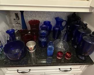 Collection of Cobalt Blue and Ruby Red Decorative Glassware, including Vases, Decanters, Pitchers, and Jars