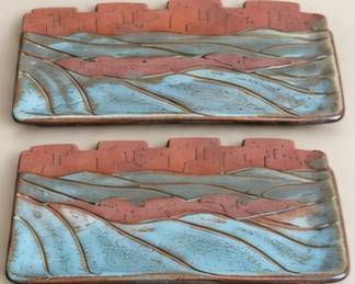 Blue and rust pottery trays. We prefer to sell as a set.