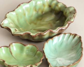 Green leaf-shaped serving dishes. We would like to sell these as a set.