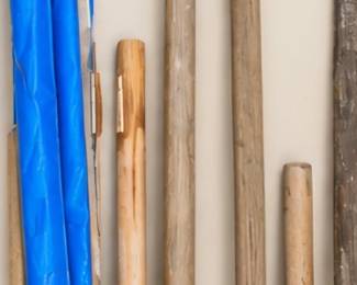 Assorted wooden poles and stakes. All separately sold
