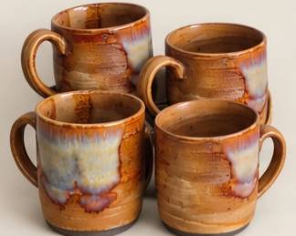 Brown glazed pottery mugs. We would prefer to sell these as a set. 