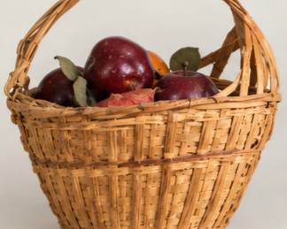 Woven basket with decorative fruit. We prefer to sell this as one item. 