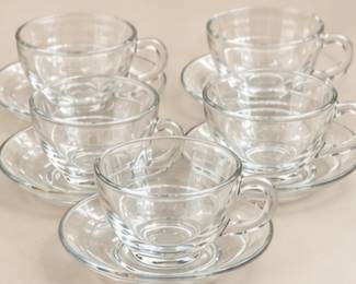 Glass cups and saucers