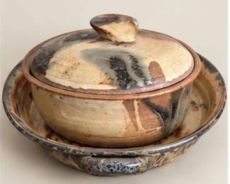 Earth-tone covered pottery casserole dishes and bowl. Sold separately. 