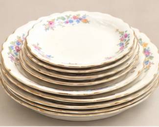 Green covered casserole with baking dishes
