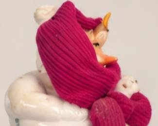 White ceramic holiday figure