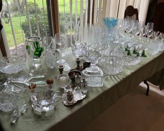 Multiple pieces of glassware and sets of glasses