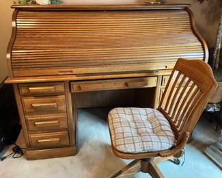 Oak roll top desk and matching oak chair presale on desk..$198