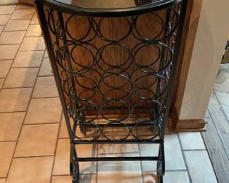 Black wrought iron wine rack