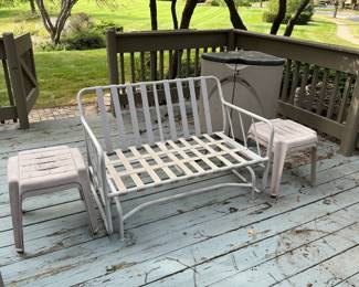 Metal loveseat is a rocker measuring 44” w x 30” w x 30” d. Four plastic side tables