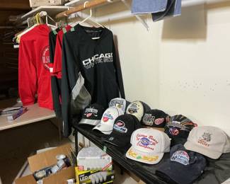 Blackhawk shirts and Stanley cup hats.  White Sox shirt and hats, bears Super Bowl hat and all six championship Bulls hat