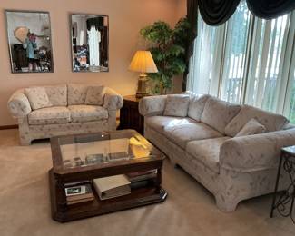 Matching loveseat and sofa with glass topped coffee table .  Sofa presale $95 and loveseat $50