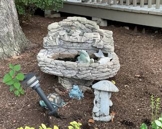 So fun…natural Rick fountain. Plus other yard art items.
