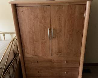 Armoire with shelving and drawers…could be a bar, use to hold baskets for clothing.  Presale $135