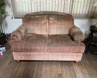 Loveseat measures 59” w x 38” d x 36” h.