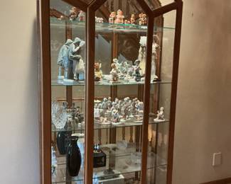 Curio cabinet…measures 41” w x 12.5 d x 82” h.  Lights and has glass shelves