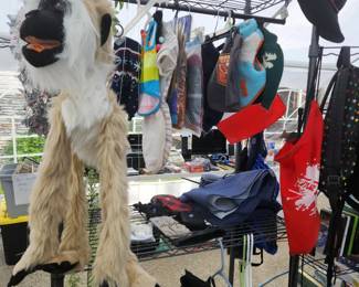 Dog coats, large puppet, shower curtain, posters, net bags, backpacks, garland