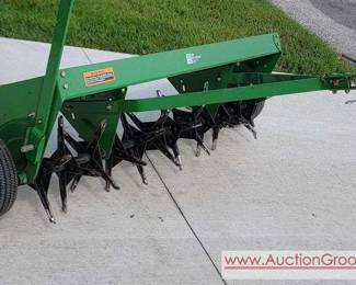 1 John Deere 48 in. TowBehind Combination AeratorSpreader