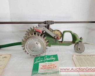 1 Vintage WALKING LAWN SPRINKLER TRACTOR