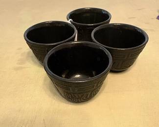 TETSUBIN CAST IRON SET OF 4 SAKI CUPS WITH GREEK MOTIF.