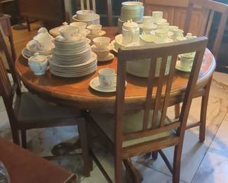 Mid-Century Modern Round Dining Table and Four Chairs