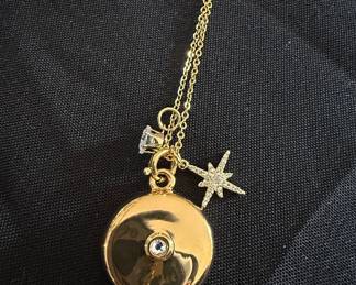 Gold-Tone Locket Necklace with Star and Solitaire Charms