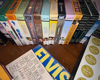 Collection of Elvis Presley VHS Tapes and Memorabilia