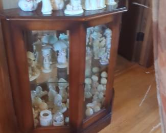Precious Moments Figurine Collection in Corner Curio Cabinet