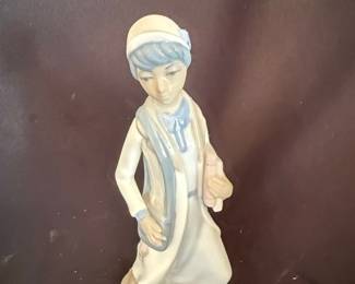 Casades Porcelain Figurine of a Girl with a Scarf and Bag