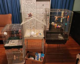 Bird Cages, accessories, and toys. Background: Ashley furniture Paxberry 5 Drawer Dressing Chest.