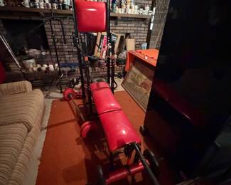 Lots of work out equipment 