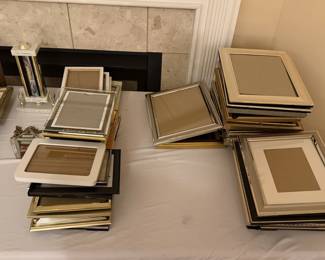 Tons of picture frames in various sizes