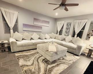 Beautiful sectional and matching ottoman set will come with lamps & end tables (rugs are for sale too)