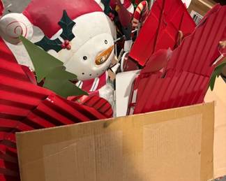 Many Christmas yard stands/signs